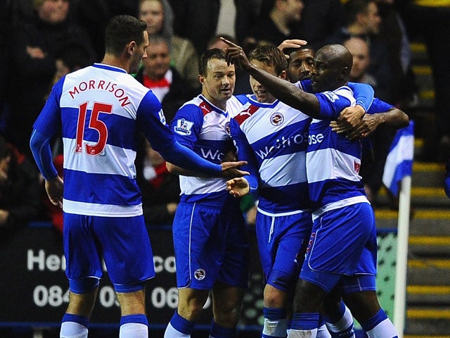 Jason Roberts of Reading celebrates scoring the first goal during the Capital One Cup Fourth Round match between Reading and Arsenal at Madejski Stadium on October 30, 2012