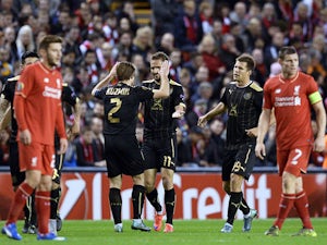 Rubin Kazan's Ukrainian striker Marko Devic (C) celebrates after scoring the first goal during a UEFA Europa League group B football match between Liverpool FC and FC Rubin Kazan at Anfield in Liverpool, north west England, on October 22, 2015