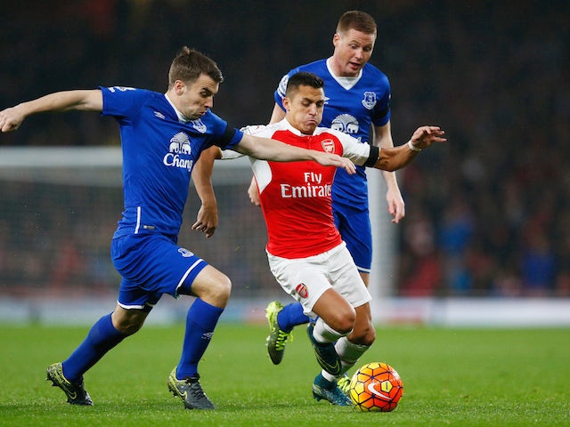 Seamus Coleman of Everton and Alexis Sanchez of Arsenal compete for the ball during the Barclays Premier League match between Arsenal and Everton at Emirates Stadium on October 24, 2015 in London, England.
