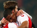 Edouard Duplan (L) of Utrecht is congratulated by team mates after he scores his teams first goal during the Dutch Eredivisie match between FC Utrecht and NAC Breda held at Stadion Galgenwaard on March 20, 2015