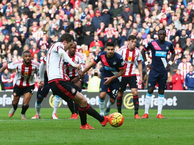 Adam Johnson of Sunderland scores his team's first goal from the penalty spot during the Barclays Premier League match between Sunderland and Newcastle United at Stadium of Light on October 25, 2015 in Sunderland, England.