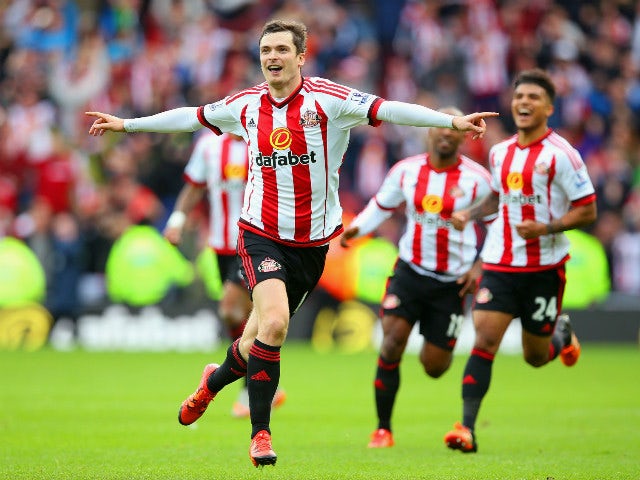 Adam Johnson of Sunderland celebrates scoring his team's first goal from the penalty spot during the Barclays Premier League match between Sunderland and Newcastle United at Stadium of Light on October 25, 2015 in Sunderland, England.