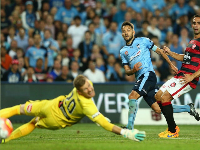 Milos Ninkovic of Sydney FC scores a goal during the round three A-League match between Sydney FC and Western Sydney Wanderers at Allianz Stadium on October 24, 2015
