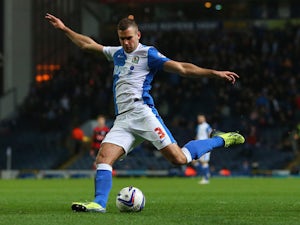 Tommy Spurr of Blackburn Rovers scores the second goal during the Sky Bet Championship match between Blackburn Rovers and Queens Park Rangers at Ewood Park on April 08, 2014