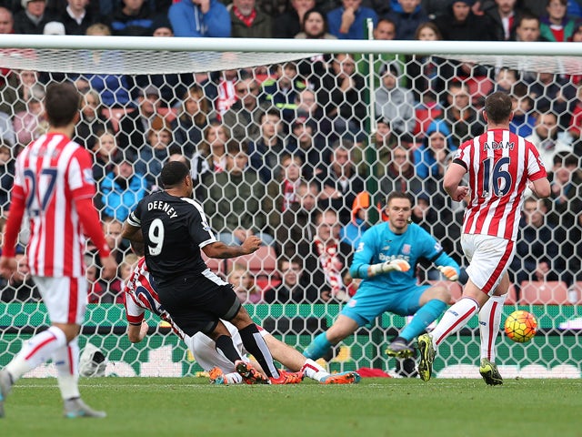 Troy Deeney of Watford scores the opening goal during the Barclays Premier League match between Stoke City and Watford on October 24, 2015