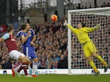 West Ham United's English striker Andy Carroll (2nd L) scores his team's second goal during the English Premier League football match between West Ham United and Chelsea at The Boleyn Ground in Upton Park, east London on October 24, 2015