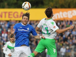 Caligiuri sees Wolfsburg past Darmstadt