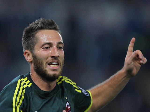 Andrea Bertolacci of AC Milan celebrates after scoring the opening goal during the Serie A match between SS Lazio and AC Milan at Stadio Olimpico on November 1, 2015