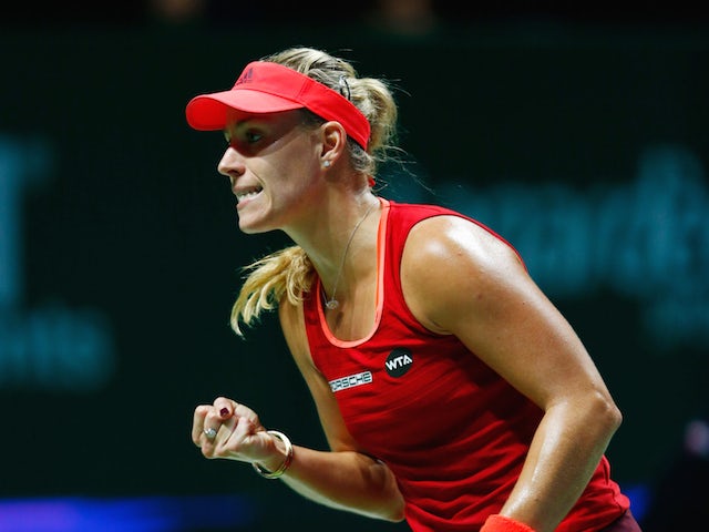 Angelique Kerber of Germany reacts during her round robin match against Petra Kvitova of Czech Republic during the BNP Paribas WTA Finals at Singapore Sports Hub on October 26, 2015 in Singapore.