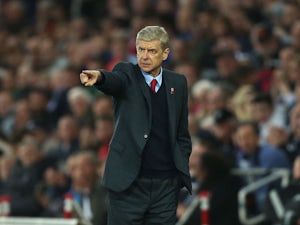 Arsene Wenger Manager of Arsenal gestures during the Barclays Premier League match between Swansea City and Arsenal at Liberty Stadium on October 31, 2015