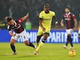 Bologna's midfielder Saphir Taider (L) vies Inter Milan's French midfielder Geoffrey Kondogbia during the Serie A football match Bologna vs InterMilan at Dall'Ara stadium in Bologna on October 27, 2015.
