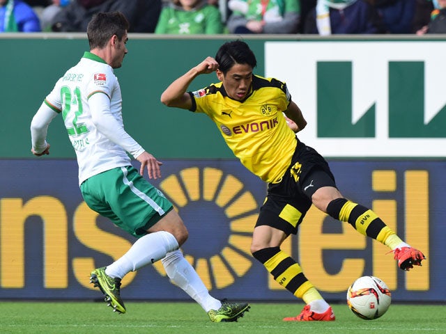 Half-Time Report: Mkhitaryan puts Dortmund in front