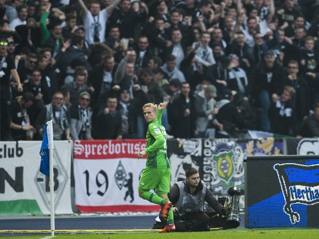 Monchengladbach's Swedish defender Oscar Wendt celebrates scoring the opening goal during during the German first division Bundesliga football match Hertha Berlin vs Borussia Monchengladbach at the Olympic stadium in Berlin on October 31, 2015