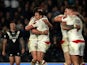 Brett Ferres (3rdL) of England celebrates scoring a try with teamates during the International Rugby League Test Series match between England and New Zealand at KC Stadium on November 1, 2015