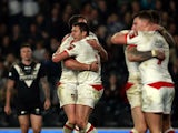 Brett Ferres (3rdL) of England celebrates scoring a try with teamates during the International Rugby League Test Series match between England and New Zealand at KC Stadium on November 1, 2015