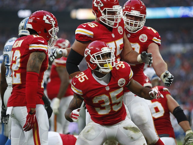 Charcandrick West #35 of Kansas City Chiefs celebrates scoring a touchdown during the NFL game between Kansas City Chiefs and Detroit Lions at Wembley Stadium on November 01, 2015 in London, England. 