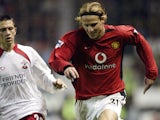 Diego Forlan (right) of Manchester United is closed down by Fabrice Fernandes of Southampton during the FA Barclaycard Premiership match between Manchester United and Southampton on November 2, 2002 played at Old Trafford in Manchester, England. Mancheste