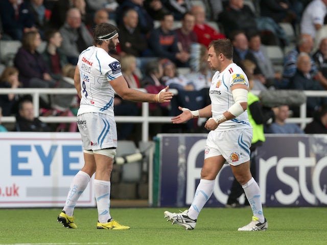 Don Armand (L) of Exeter Chiefs celebrates with team-mate Ben Moon after he scores a try for his side during the Aviva Premiership match between Newcastle Falcons and Exeter Chiefs at Kingston Park on November 1, 2015 in Newcastle upon Tyne, England.