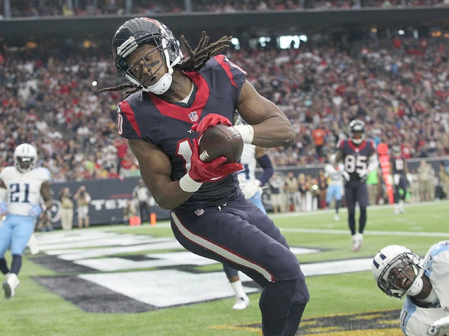 DeAndre Hopkins #10 of the Houston Texans makes a touchdown catch against Jason McCourty #30 of the Tennessee Titans in the second quarter on November 1, 2015