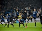 Inter Milan's players celebrate after the Italian Serie A football match Inter Milan vs AS Roma on October 31, 2015 at the San Siro Stadium in Milan.