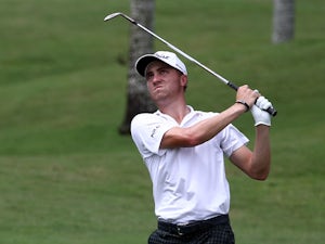 Thomas surges to top of CIMB leaderboard