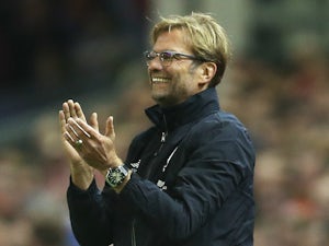 Jurgen Klopp, manager of Liverpool applauds during the Capital One Cup Fourth Round match between Liverpool and AFC Bournemouth at Anfield on October 28, 2015 in Liverpool, England.