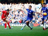 Philippe Coutinho of Liverpool scores his team's second goal during the Barclays Premier League match between Chelsea and Liverpool at Stamford Bridge on October 31, 2015