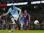 Manchester City's Ivorian midfielder and captain Yaya Toure scores their fourth goal from the penalty spot during the English League Cup fourth round football match between Manchester City and Crystal Palace at The Etihad Stadium in Manchester, north west
