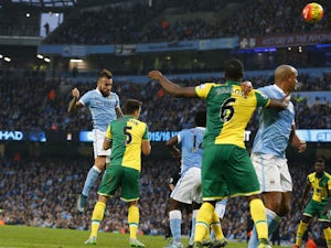 Late Toure penalty gives Man City win