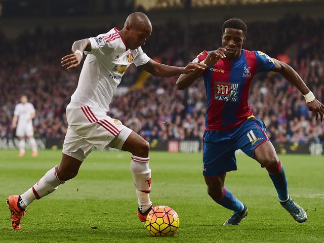 Ashley Young of Manchester United and Wilfried Zaha of Crystal Palace compete for the ball during the Barclays Premier League match between Crystal Palace and Manchester United at Selhurst Park on October 31, 2015