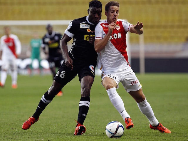 Monaco's Croatian midfielder Mario Pasalic (R) challenges Angers' Ivorian defender Ismael Traore (L) during the French L1 football match between Monaco and Angers at the Louis II stadium in Monaco on November 1, 2015.