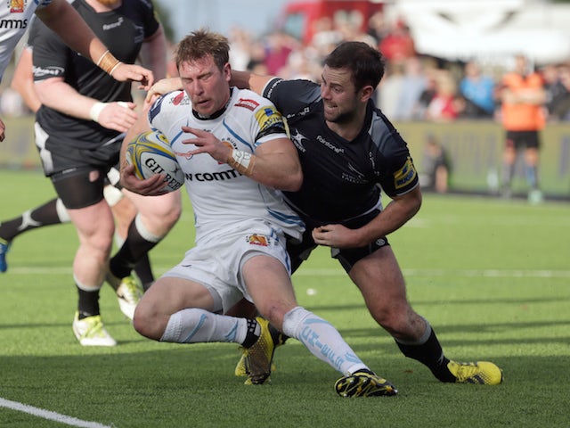 Michael Young (R) of Newcastle Falcons tackles Will Chudley of Exeter Chiefs during the Aviva Premiership match between Newcastle Falcons and Exeter Chiefs at Kingston Park on November 1, 2015 in Newcastle upon Tyne, England. 