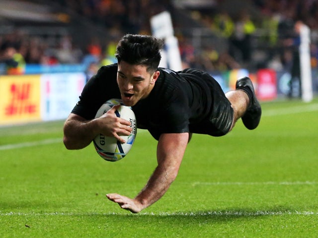 Nehe Milner-Skudder of New Zealand dives over the line to score the first try of the match during the 2015 Rugby World Cup Final match between New Zealand and Australia at Twickenham Stadium on October 31, 2015
