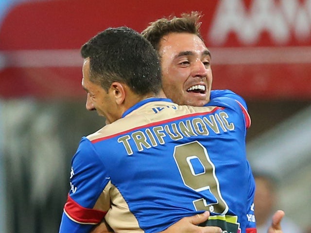 Benjamin Kantarovsji of the Jets is congartulated by Milos Trifunovic after scoring a goal during the round four A-League match between Melbourne City FC and Newcastle Jets at AAMI Park on October 30, 2015