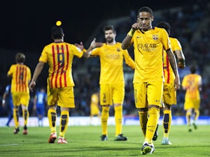 Neymar JR. (R) of FC Barcelona celebrates scoring their second goal with teammate during the La Liga match between Getafe CF and FC Barcelona at Coliseum Alfonso Perez on October 31, 2015 in Getafe, Spain. 