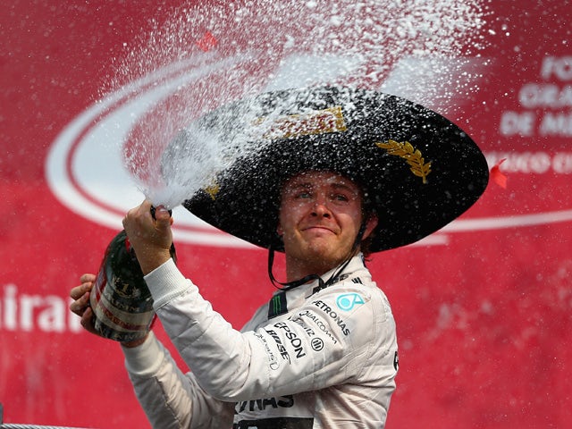 Nico Rosberg of Germany and Mercedes GP celebrates on the podium after winning the Formula One Grand Prix of Mexico at Autodromo Hermanos Rodriguez on November 1, 2015