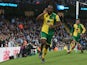 Cameron Jerome of Norwich City celebrates scoring his team's first goal during the Barclays Premier League match between Manchester City and Norwich City at Etihad Stadium on October 31, 2015