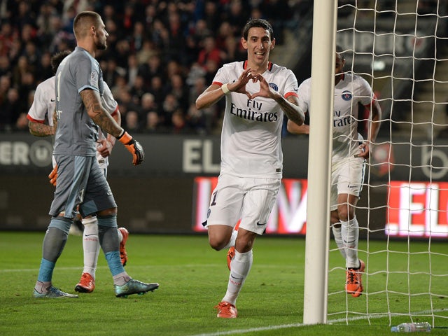 Paris Saint-Germain's Argentinian forward Angel Di Maria (C) celebrates after scoring a goal during the French L1 football match between Rennes and Paris Saint-Germain on October 30, 2015