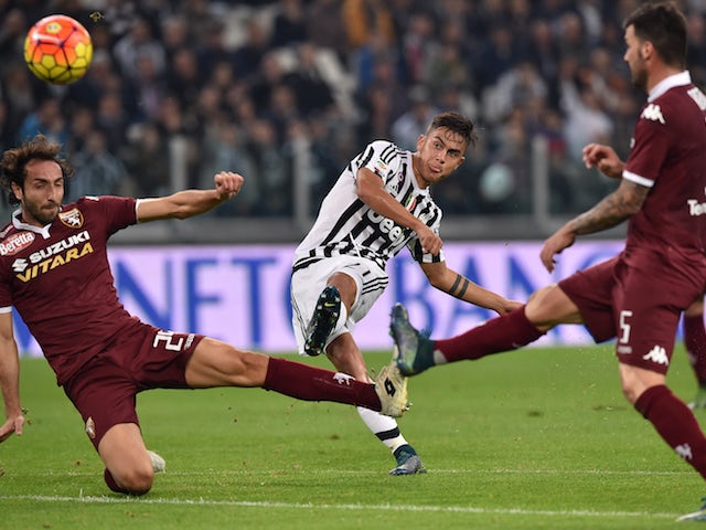 Paulo Dybala (C) Of Juventus FC Kicks The Ball During The Serie A Match ...