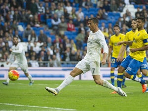 Real Madrid's Portuguese forward Cristiano Ronaldo controls the ball during the Spanish league football match Real Madrid CF vs UD Las Palmas at the Santiago Bernabeu stadium in Madrid on October 31, 2015