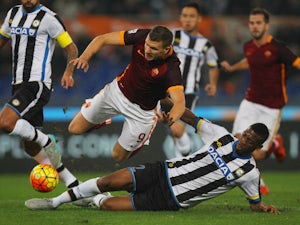 Roma crush Udinese to go clear at the top