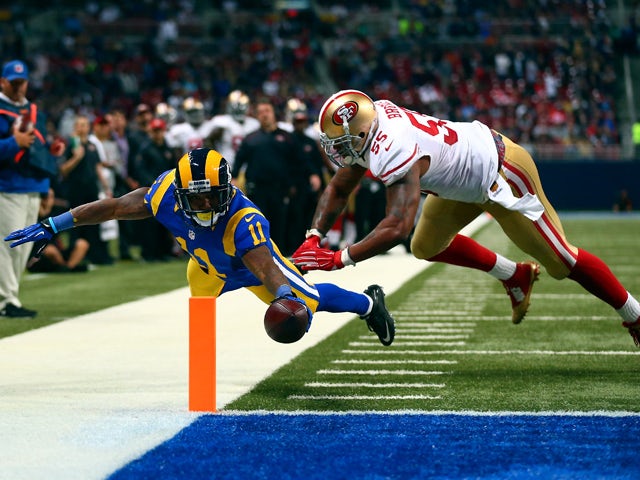 Tavon Austin #11 of the St. Louis Rams scores a touchdown past Ahmad Brooks #55 of the San Francisco 49ers in the second quarter at the Edward Jones Dome on November 1, 2015
