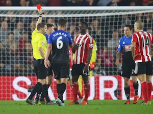 Victor Wanyama of Southampton (3R) is shown a red card by referee Craig Pawson and is sent off during the Barclays Premier League match between Southampton and A.F.C. Bournemouth at St Mary's Stadium on November 1, 2015