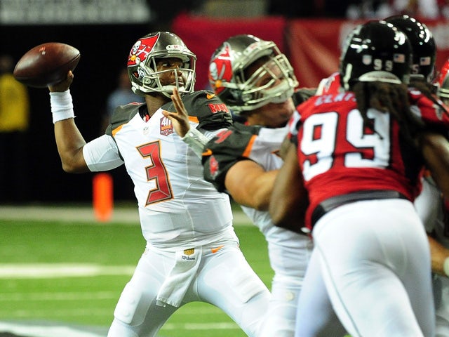Jameis Winston #3 of the Tampa Bay Buccaneers drops back to pass during the first half against the Atlanta Falcons at the Georgia Dome on November 1, 2015