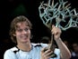 Tomas Berdych of the Czech Republic holds aloft the trophy after his five set victory against Ivan Ljubicic of Croatia in the final of the BNP Paribas ATP Masters Series on November 6, 2005