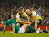 Tommy Bowe of Ireland receives treatment for an injury during the 2015 Rugby World Cup Quarter Final match between Ireland and Argentina at the Millennium Stadium on October 18, 2015