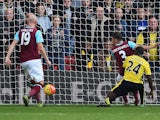 Odion Ighalo of Watford scores his team's first goal during the Barclays Premier League match between Watford and West Ham United at Vicarage Road on October 31, 2015