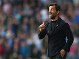 Quique Flores manager of Watford gestures during the Barclays Premier League match between Watford and West Ham United at Vicarage Road on October 31, 2015