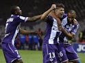 Toulouse's French midfielder Zinedine Machach (C) celebrates with teammates after scoring a goal during the French L1 football match Toulouse vs Montpellier, on October 31, 2015 at the Municipal Stadium in Toulouse, southwestern France. 