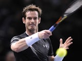 Britain's Andy Murray returns the ball to Spain's David Ferrer during their semi-final tennis match at the ATP World Tour Masters 1000 indoor tennis tournament in Paris on November 7, 2015.